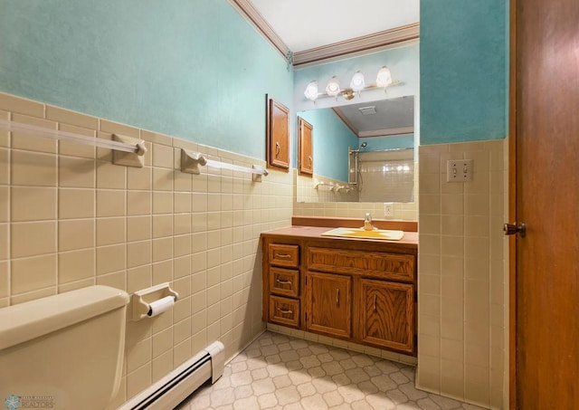 3667 Evergreen Rd N, Fargo, ND 58102 - bathroom with tile walls, ornamental molding, vanity, and toilet