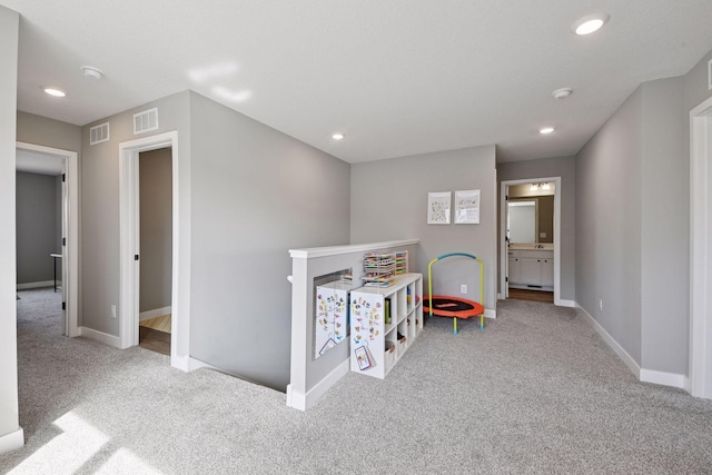 1072 Shoreview Dr, Jordan, MN 55352 - corridor with carpet, baseboards, recessed lighting, and an upstairs landing
