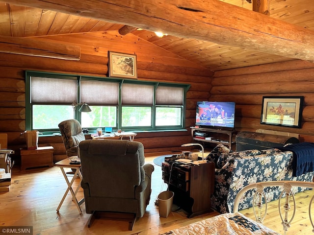 living room featuring light wood finished floors, rustic walls, and wood ceiling