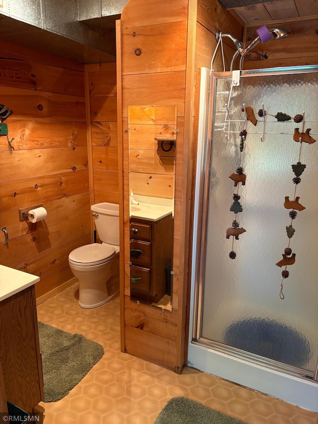 4701 Shangri La Dr NE, Wabedo Twp, MN 56655 - bathroom with a stall shower, vanity, and tile patterned floors
