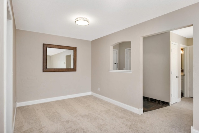 2200 Nevada Ave S Unit 313, Saint Louis Park, MN 55426 - carpeted spare room featuring baseboards