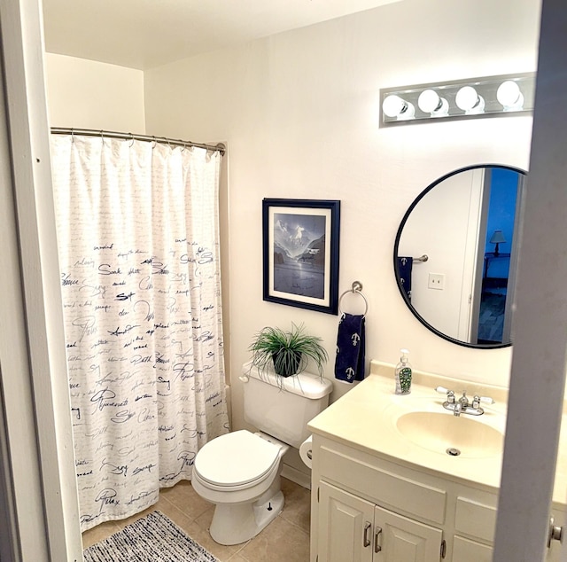 3568 Cloman Way, Inver Grove Heights, MN 55076 - full bath with tile patterned floors, toilet, vanity, and a shower with shower curtain