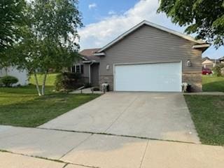 5047 Florence Dr NW, Rochester, MN 55901 - ranch-style house with an attached garage, a front lawn, and concrete driveway