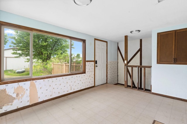 W11651 State Road 35, Oak Grove Twp, WI 54021 - unfurnished room featuring light flooring and baseboards