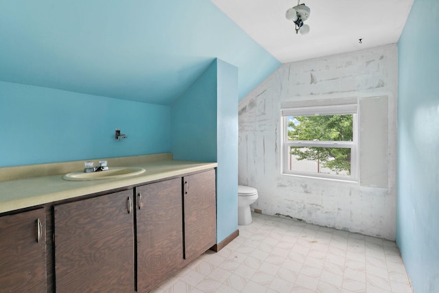 W11651 State Road 35, Oak Grove Twp, WI 54021 - bathroom with lofted ceiling, vanity, and tile patterned floors
