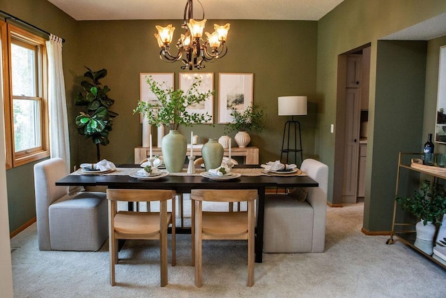 2505 Christian Dr, Chaska, MN 55318 - carpeted dining room with a chandelier and baseboards