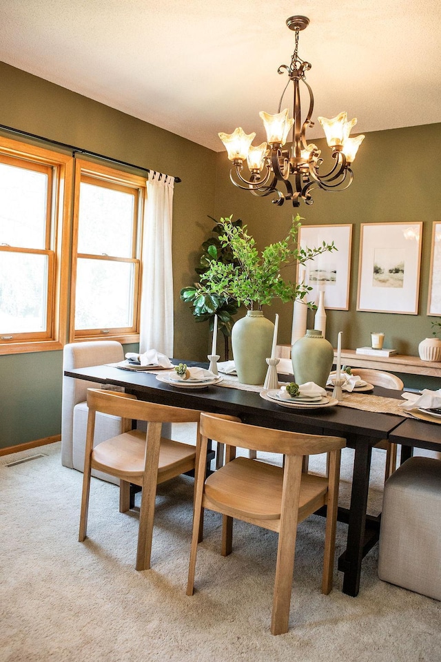 2505 Christian Dr, Chaska, MN 55318 - dining room featuring a chandelier and carpet