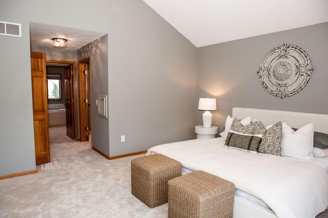2505 Christian Dr, Chaska, MN 55318 - bedroom with vaulted ceiling, baseboards, and light carpet