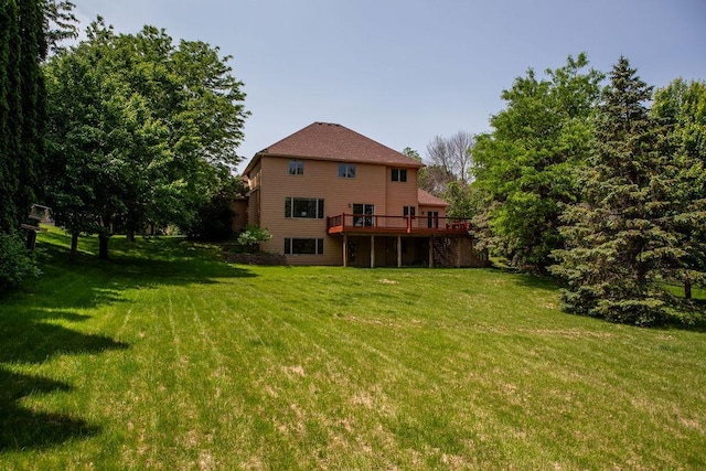 2505 Christian Dr, Chaska, MN 55318 - rear view of house with a deck and a yard