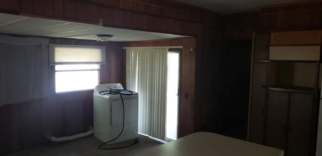 11347 3rd St NE, Blaine, MN 55434 - washroom with washer / dryer and wood walls