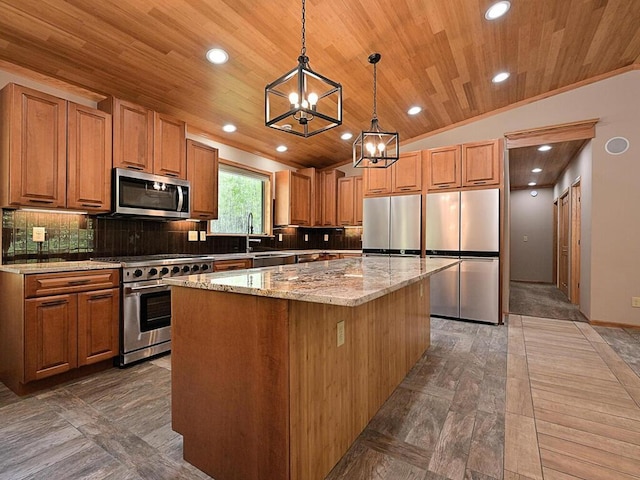 33272 Big Pine Trl, Grand Rapids, MN 55744 - kitchen featuring stainless steel appliances, wooden ceiling, lofted ceiling, a kitchen island, and brown cabinetry