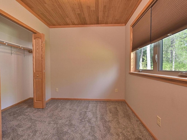 33272 Big Pine Trl, Grand Rapids, MN 55744 - unfurnished bedroom with carpet floors, crown molding, a closet, baseboards, and wooden ceiling