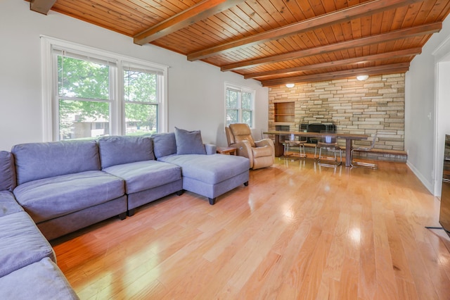 30105 Olinda Trl, Lindstrom, MN 55045 - living room featuring light wood-style floors, a fireplace, beam ceiling, and wood ceiling