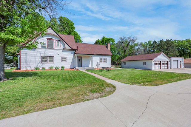 30105 Olinda Trl, Lindstrom, MN 55045 - victorian-style house with an outdoor structure, a garage, a chimney, a front yard, and driveway