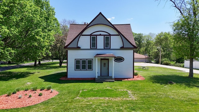30105 Olinda Trl, Lindstrom, MN 55045 - view of front of home with a front lawn and a shingled roof