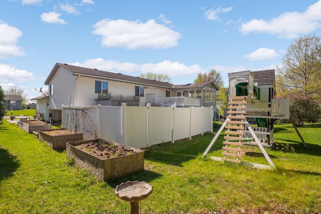 409 5th St NW, Saint Michael, MN 55376 - rear view of property with a garden