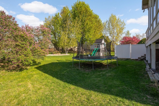409 5th St NW, Saint Michael, MN 55376 - view of yard with a trampoline and a playground