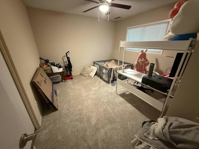 carpeted bedroom with a ceiling fan