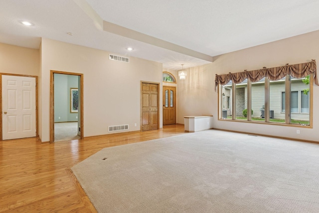 12124 Bluebird Cir NW, Coon Rapids, MN 55448 - unfurnished room with light wood-style floors, recessed lighting, and baseboards