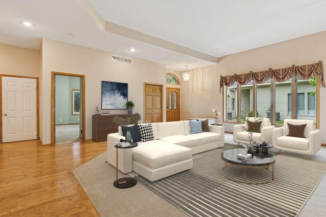 12124 Bluebird Cir NW, Coon Rapids, MN 55448 - living room featuring light wood-style floors and recessed lighting
