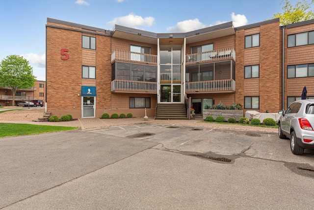 5440 Three Points Blvd Unit 536, Mound, MN 55364 - view of building exterior featuring uncovered parking