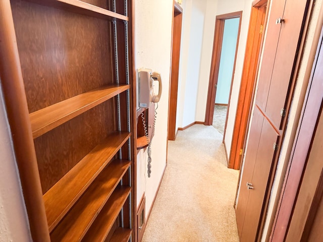 404 5th Ave, Wilmont, MN 56185 - hallway featuring light carpet and baseboards