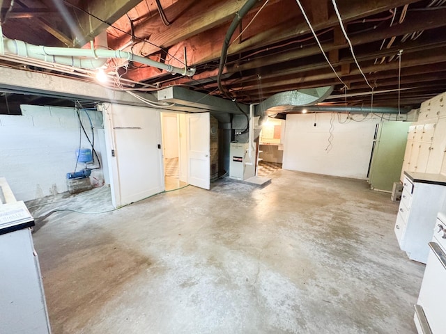 404 5th Ave, Wilmont, MN 56185 - unfinished basement featuring heating unit