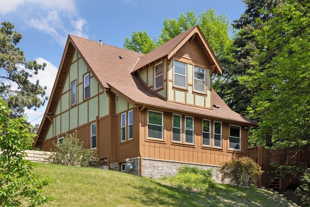 1125 James Ave, Saint Paul, MN 55105 - view of side of home with a shingled roof