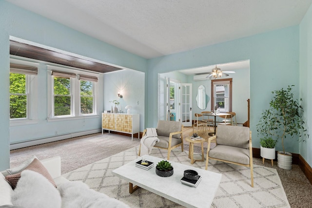 1125 James Ave, Saint Paul, MN 55105 - living area featuring baseboard heating, baseboards, a ceiling fan, french doors, and an AC wall unit