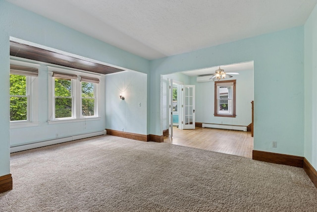 1125 James Ave, Saint Paul, MN 55105 - empty room with a baseboard radiator, baseboards, and carpet flooring