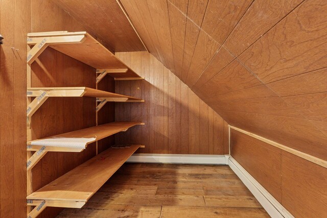 1125 James Ave, Saint Paul, MN 55105 - spacious closet featuring hardwood / wood-style floors and vaulted ceiling