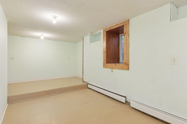1125 James Ave, Saint Paul, MN 55105 - spare room with baseboard heating and a textured ceiling