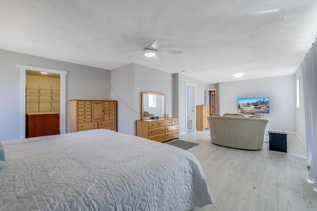 8678 Boiling Springs Ln, Shakopee, MN 55379 - bedroom with light wood finished floors and a ceiling fan