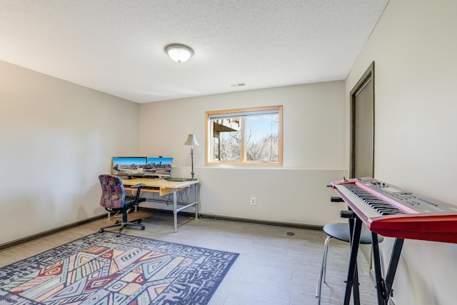 8678 Boiling Springs Ln, Shakopee, MN 55379 - office space with a textured ceiling and baseboards