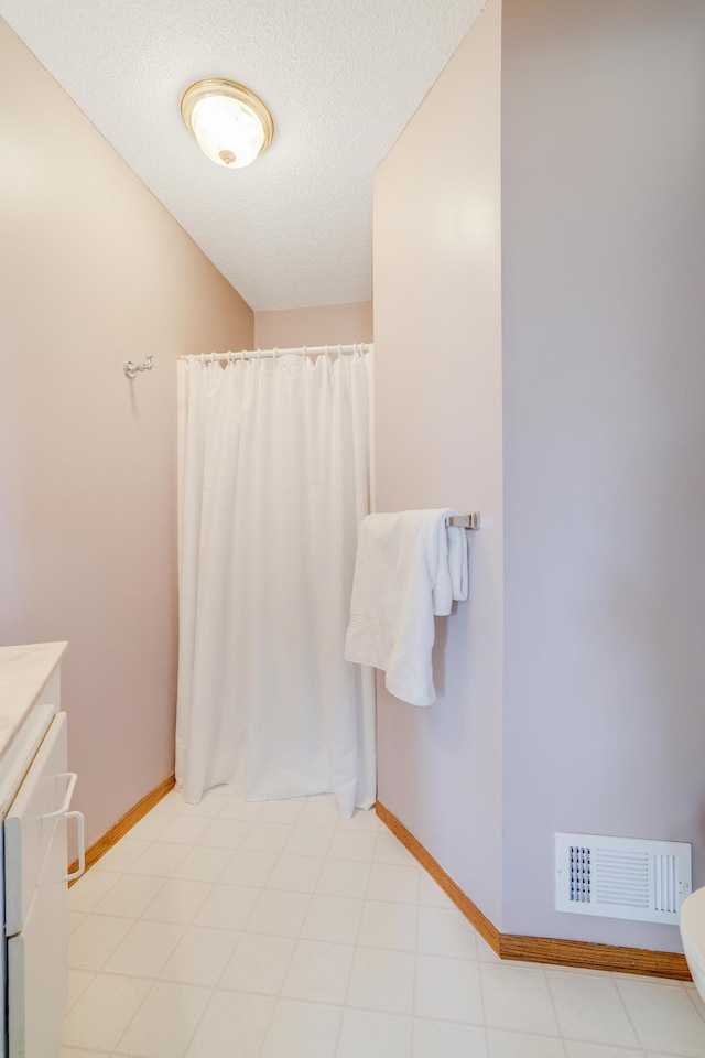 8678 Boiling Springs Ln, Shakopee, MN 55379 - full bathroom with vanity, a textured ceiling, and curtained shower