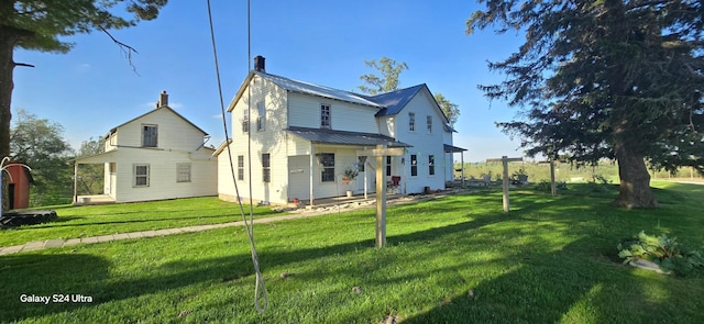 38901 134th St, Canton Twp, MN 55922 - back of property with a lawn and metal roof