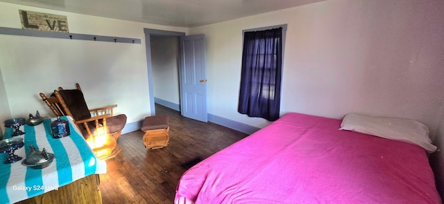 38901 134th St, Canton Twp, MN 55922 - bedroom featuring wood finished floors and baseboards