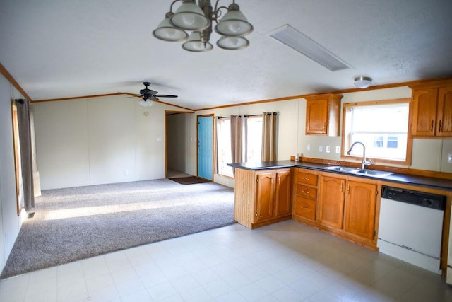 kitchen featuring white dishwasher, light carpet, a sink, brown cabinetry, and lofted ceiling