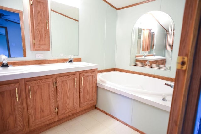 full bathroom featuring a bath, double vanity, and ornamental molding
