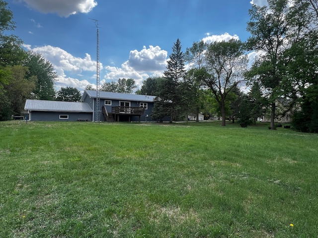 1416 13th Ave, Clarkfield, MN 56223 - view of grassy yard with a deck