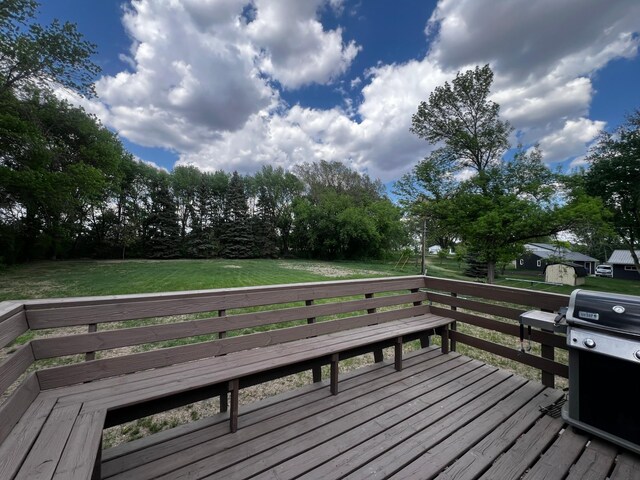 1416 13th Ave, Clarkfield, MN 56223 - deck with a lawn and area for grilling