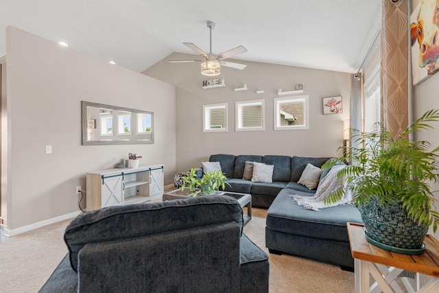 20938 Grommet Ave, Lakeville, MN 55044 - living area with light colored carpet, a ceiling fan, vaulted ceiling, and baseboards