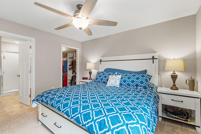 20938 Grommet Ave, Lakeville, MN 55044 - bedroom featuring a spacious closet, light colored carpet, a closet, and ceiling fan
