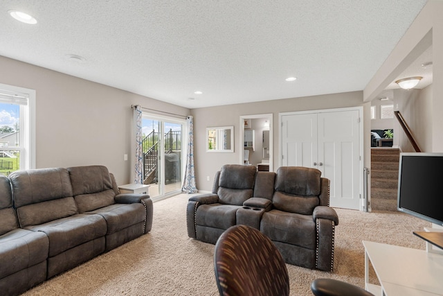 20938 Grommet Ave, Lakeville, MN 55044 - carpeted living room featuring recessed lighting, stairway, and a textured ceiling