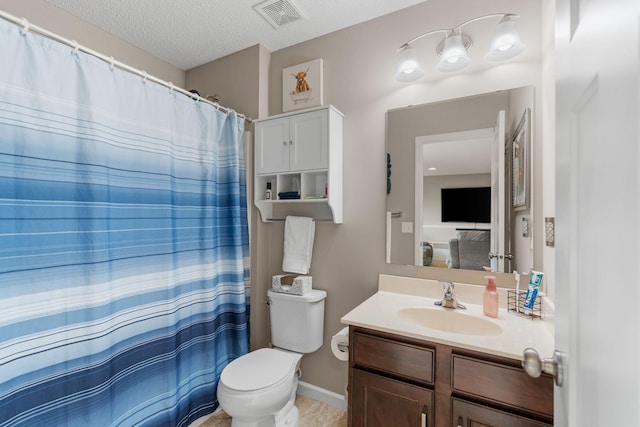 20938 Grommet Ave, Lakeville, MN 55044 - bathroom with toilet, vanity, a textured ceiling, and curtained shower