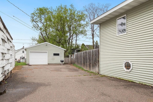 435 6th St, Cloquet, MN 55720 - detached garage with fence and driveway