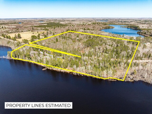21895 County Road 8, Bovey, MN 55709 - aerial view of property's location featuring property boundaries highlighted and a large body of water
