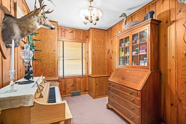 21895 County Road 8, Bovey, MN 55709 - office area featuring wooden walls, carpet flooring, and a chandelier