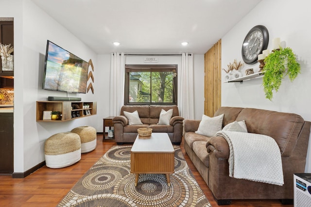 6242 Pecan St, North Branch, MN 55056 - living area with wood finished floors, recessed lighting, and baseboards