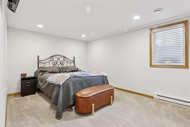 6242 Pecan St, North Branch, MN 55056 - bedroom featuring a baseboard heating unit, light colored carpet, baseboards, and recessed lighting